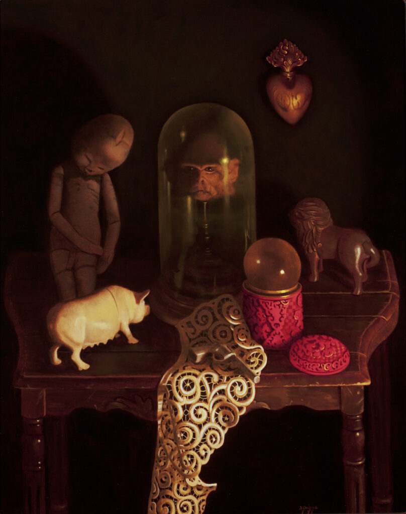 Dan Griggs: Still with Monkey Head and Midwife Doll